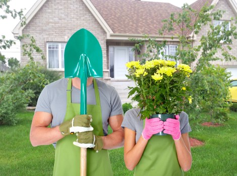Customer using secure device to pay for gardening services